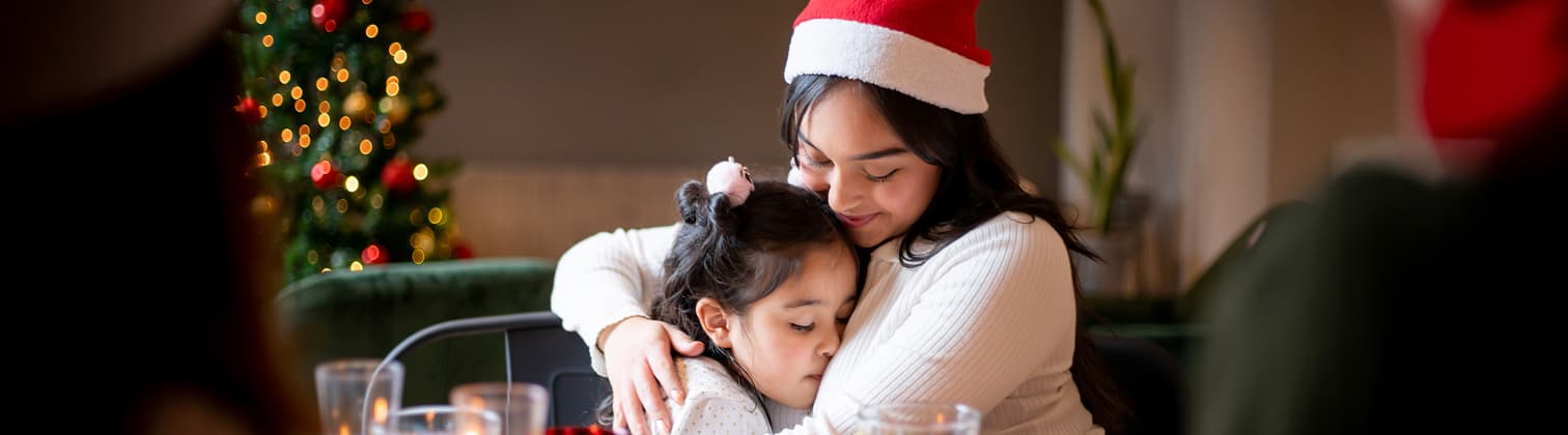Food bank volunteer preparing Christmas donations.
